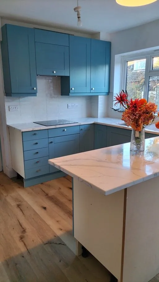 Kitchen in Salisbury SP1, Wiltshire resprayed deep blue by Kitchen Decorators