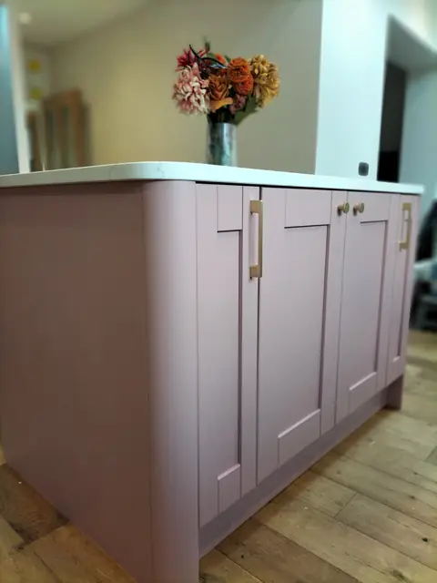 Dusky pink painted kitchen island